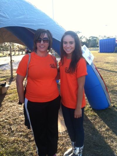Pictured with Ashley is Joy Chuba, the Director for Osceola County Children's Advocacy Center.